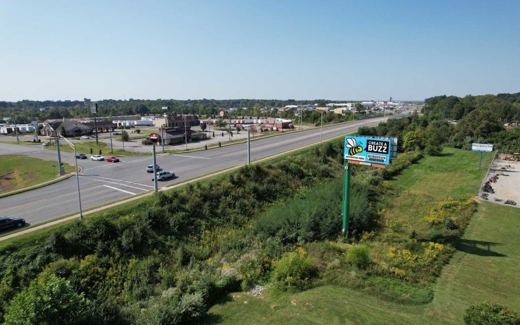A highway with a sign on the side of it.