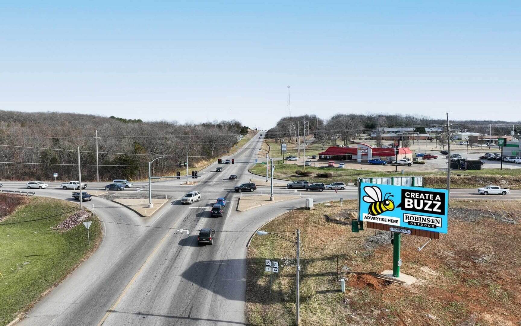 A busy highway with cars driving on it.