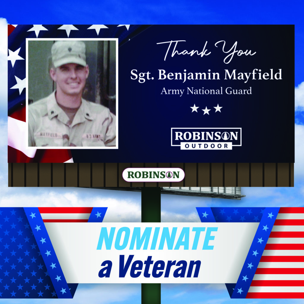 A billboard with a picture of sgt. Benjamin mayfield