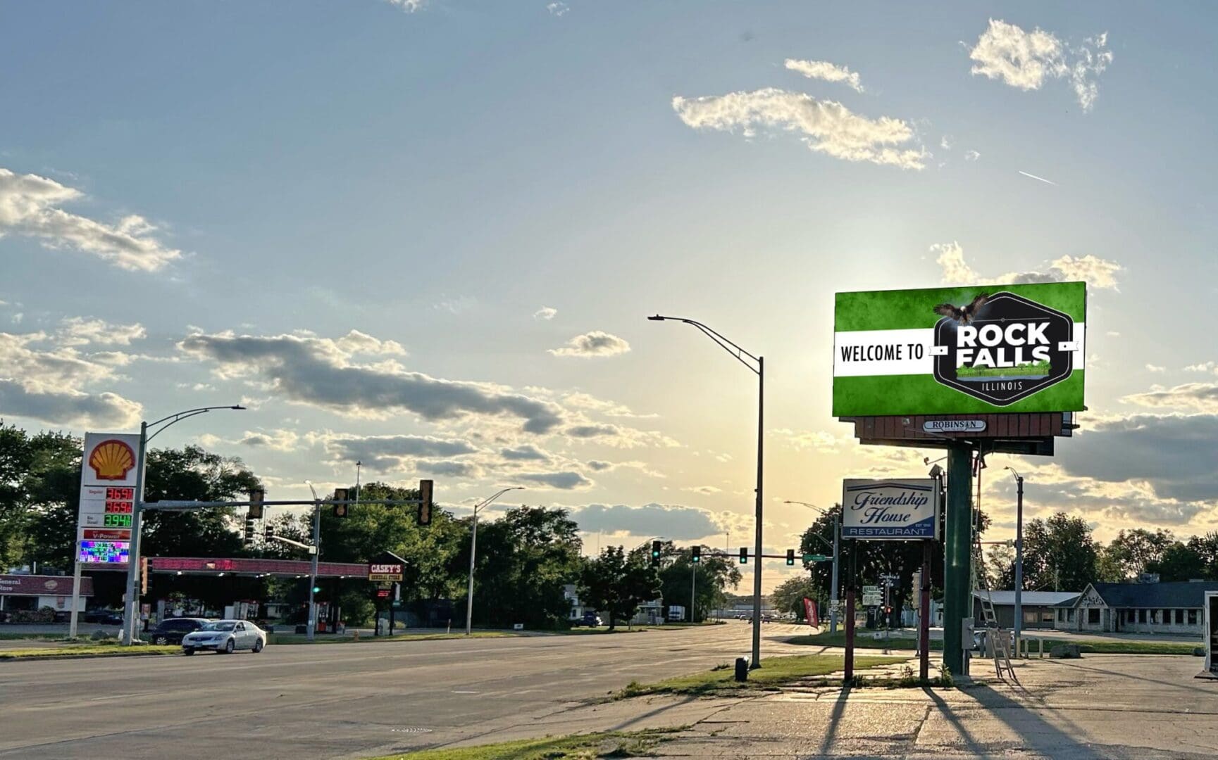 A street sign on the side of a road.
