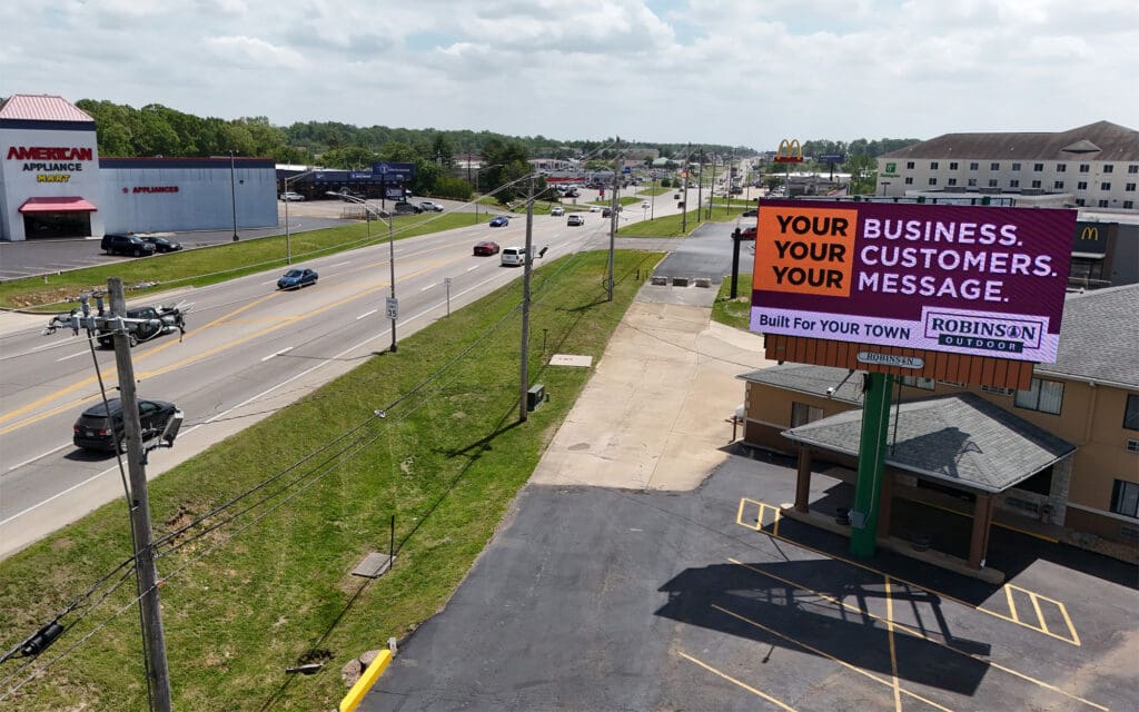 Billboard advertising along suburban roadside