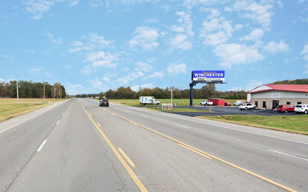 Wide rural road with Winchester billboard