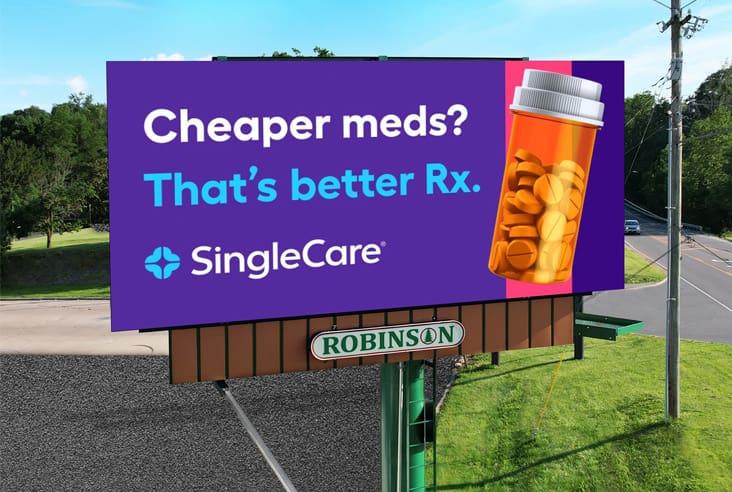 Billboard advertisement for SingleCare with pill bottle